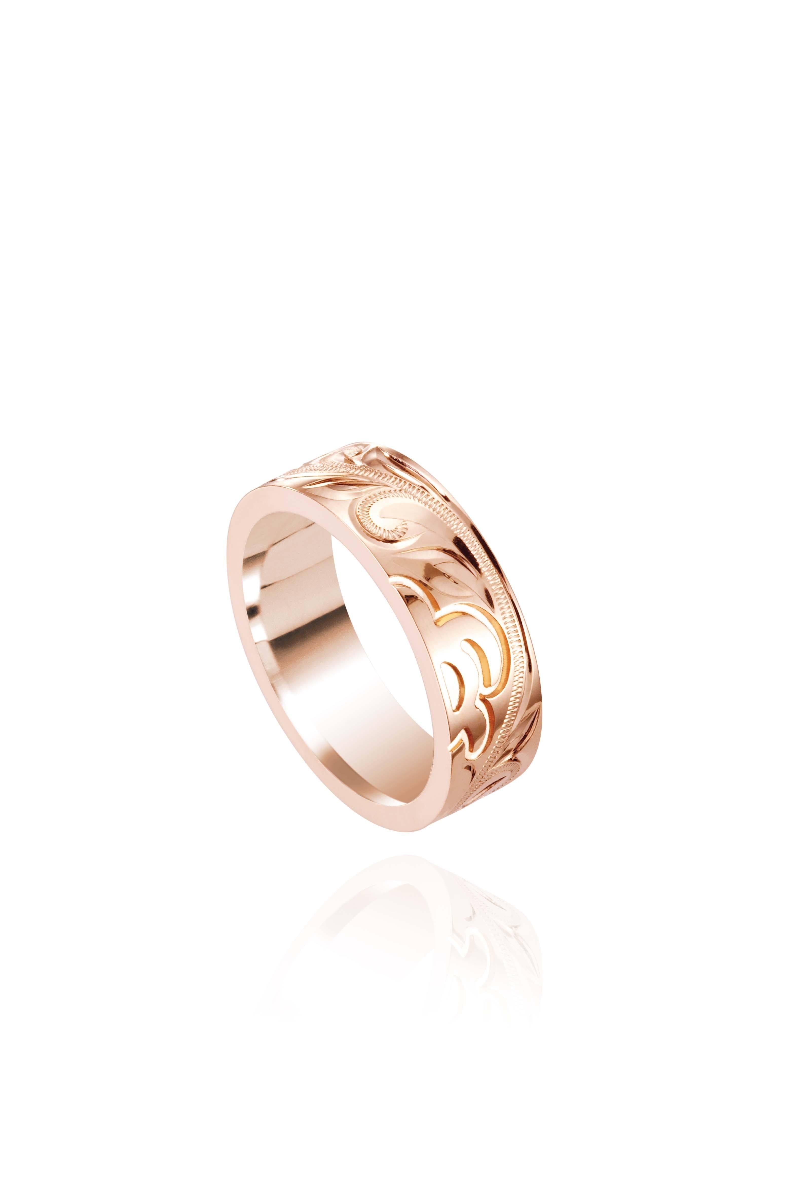 The picture shows a 14K rose gold sea turtle 6 mm Naupaka ring.
