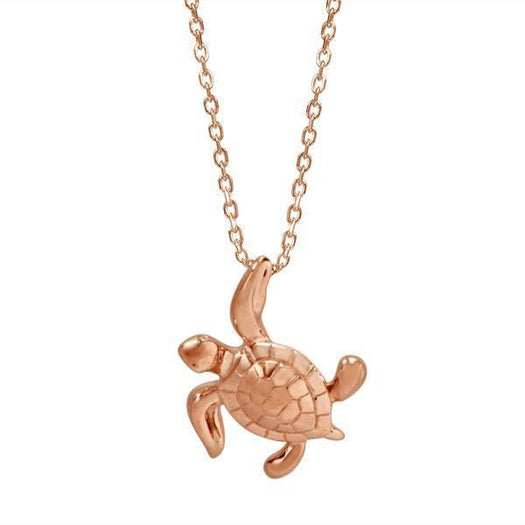 The picture shows a 14K rose gold sea turtle necklace.