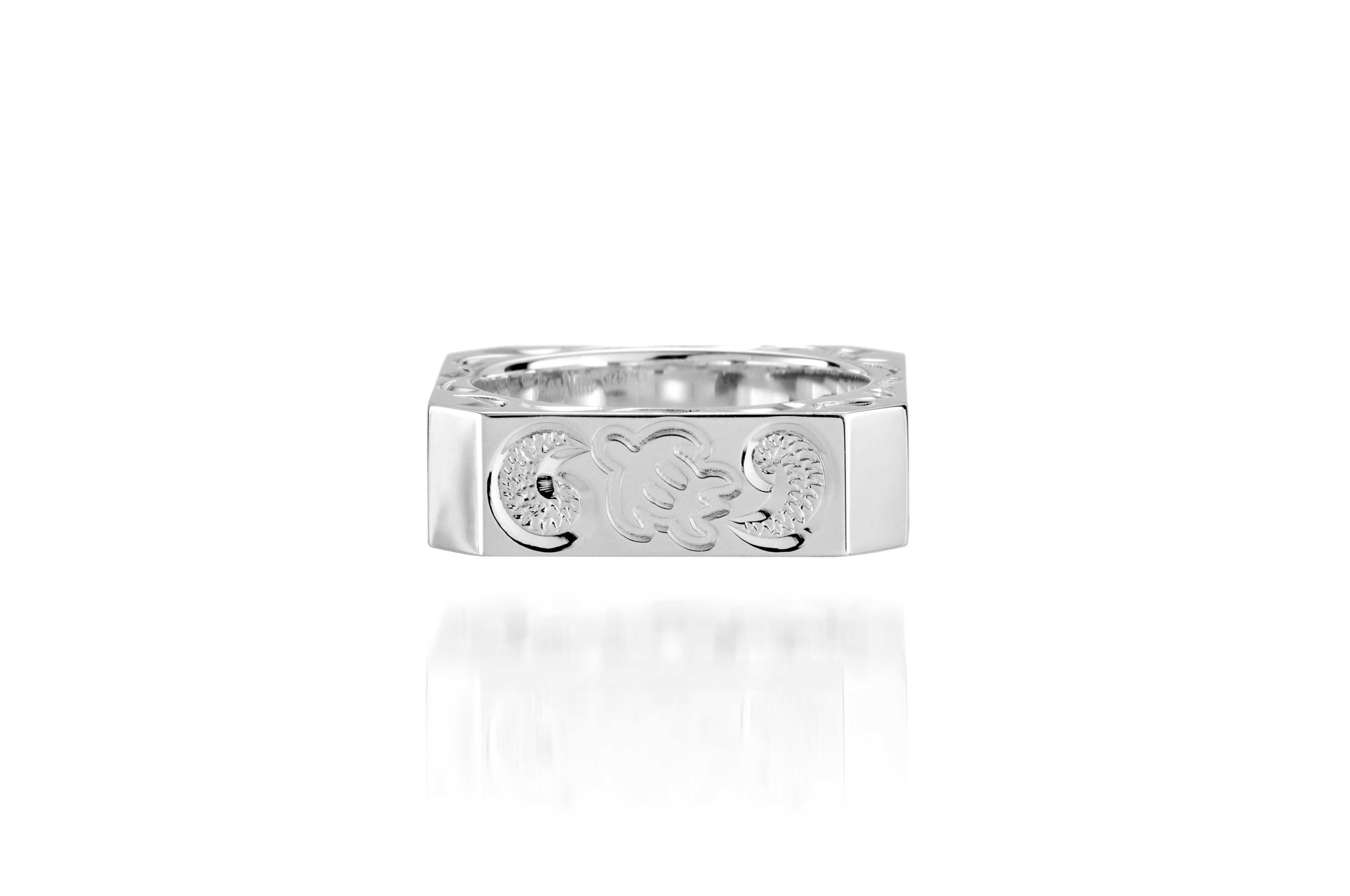 The picture shows a 925 sterling silver squared 8mm ring with hand engravings including a sea turtle.