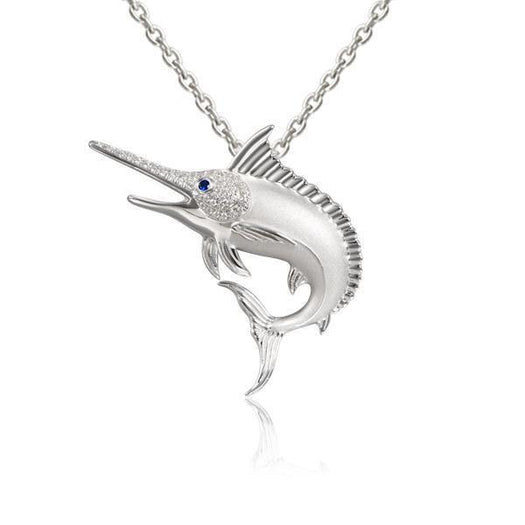 The picture shows a 925 sterling silver marlin pendant with cubic topaz and sapphire.