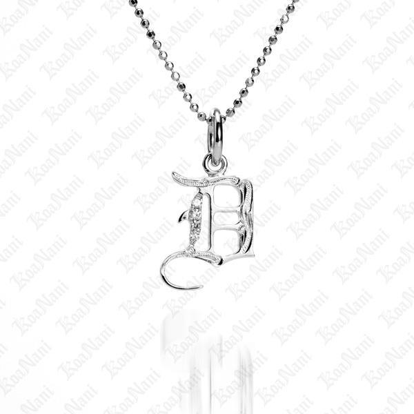 The picture shows a 14K white gold Koa Nani D initial pendant.