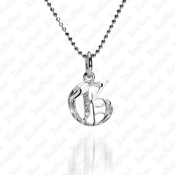 The picture shows a 14K white gold Koa Nani G initial pendant.