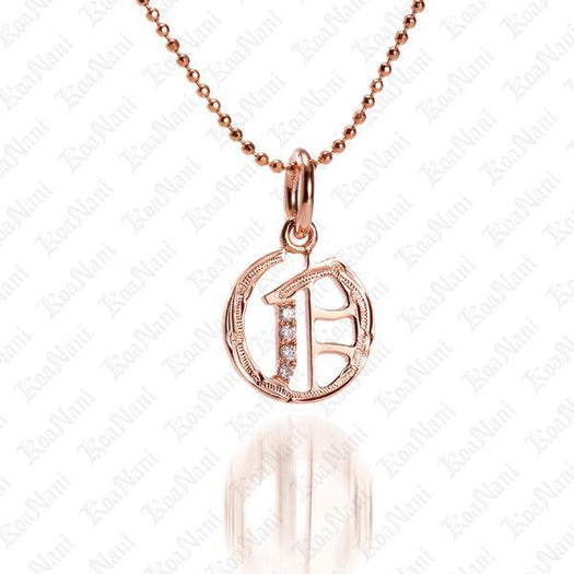 The picture shows a 14K rose gold Koa Nani O initial pendant.