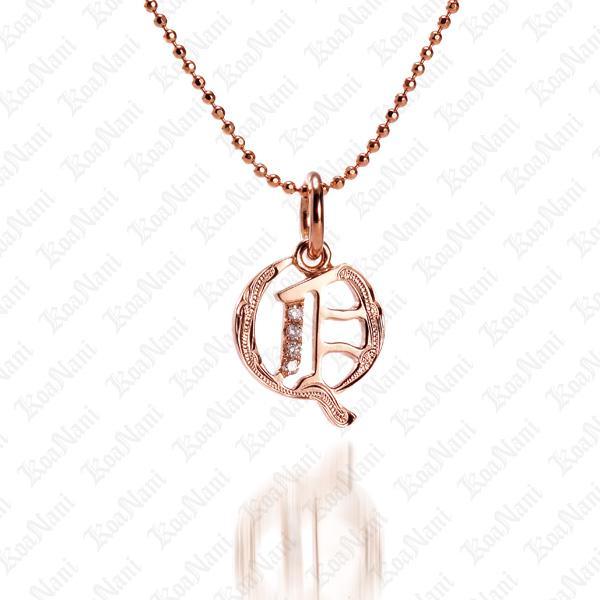 The picture shows a 14K rose gold Koa Nani Q initial pendant.