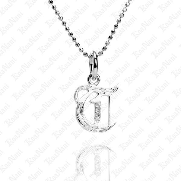 The picture shows a 14K white gold Koa Nani T initial pendant.