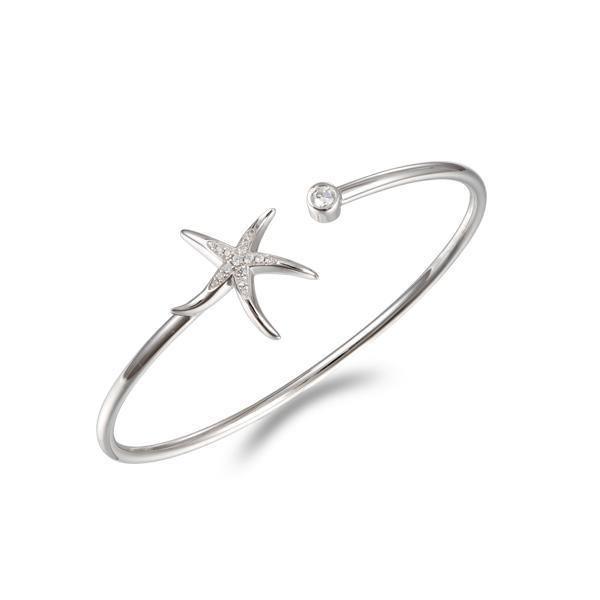 The picture shows a 925 sterling silver starfish bangle with topaz.