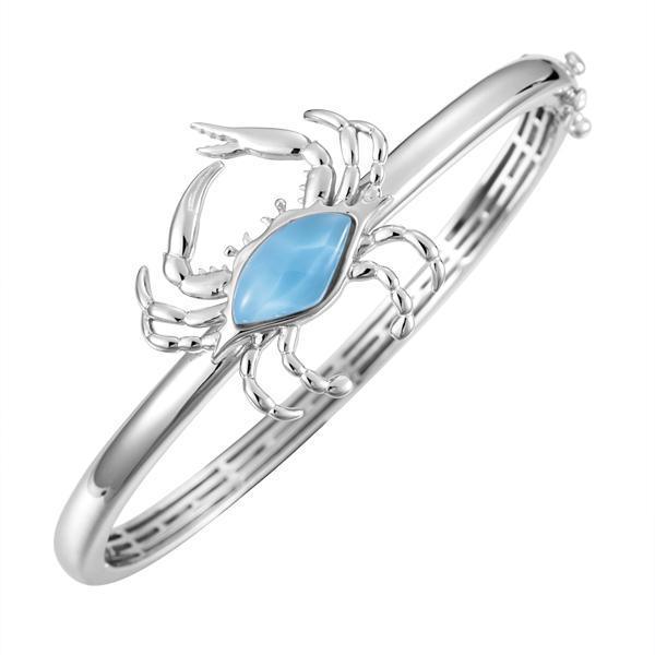 The picture shows a 925 sterling silver larimar blue crab bangle.