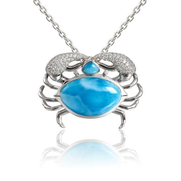 The picture shows a 925 sterling silver blue crab treasure pendant  with hand-selected larimar gemstones and topaz.