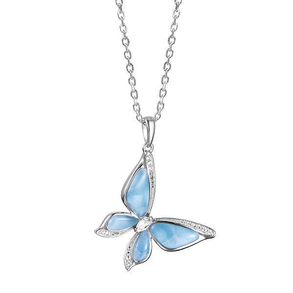 In this photo there is a sterling silver butterfly pendant with blue larimar gemstones and topaz.