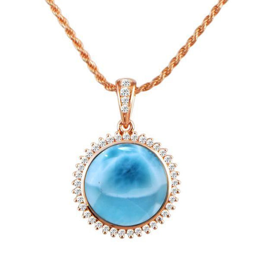 The picture shows a large 14K rose gold larimar circle pendant with diamonds.