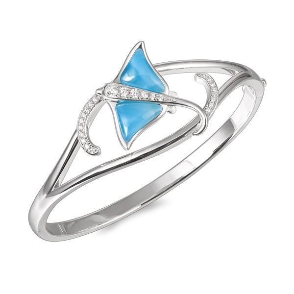 The picture shows a 925 sterling silver larimar eagle ray bangle with topaz.