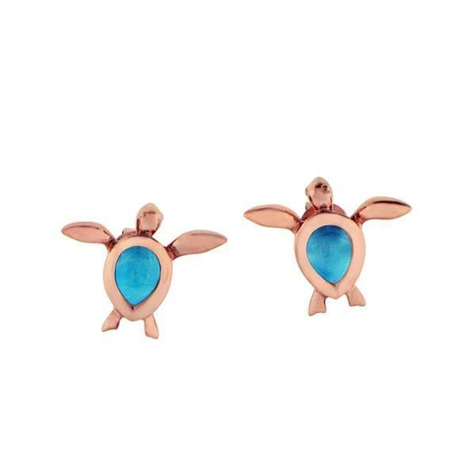 The picture shows a pair of 14K rose gold sea turtle stud earrings with larimar gemstones.