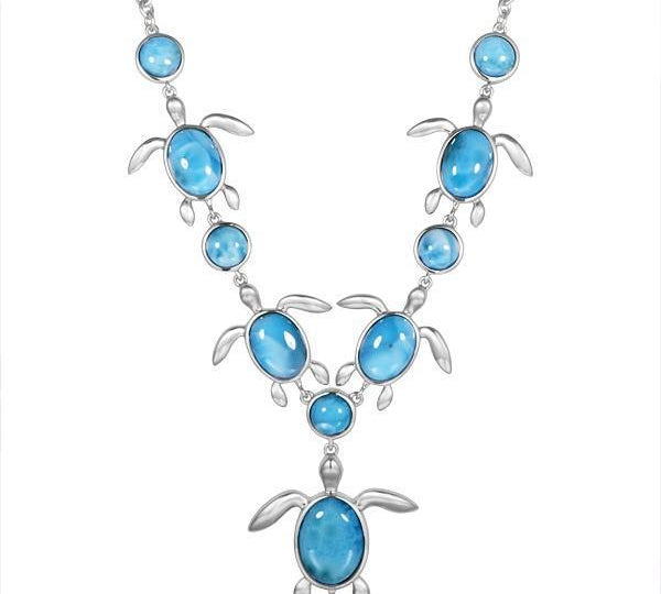 The picture shows a 925 sterling silver larimar sea turtle charm necklace.