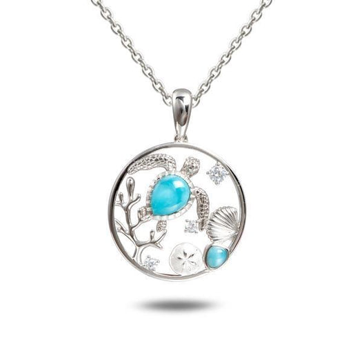 The picture shows a 925 sterling silver larimar sea turtle pendant with larimar gemstones and topaz.