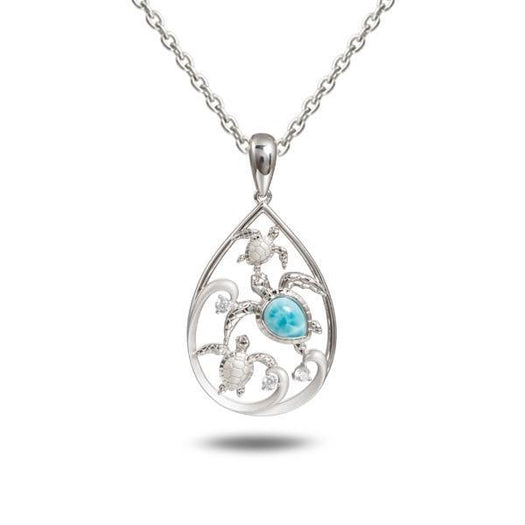 The picture shows a 925 sterling silver teardrop shaped pendant with 3 sea turtles in the center with cubic zirconia and larimar.