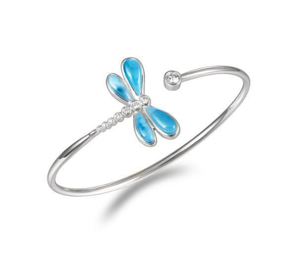 In this photo there is a 925 sterling silver dragonfly bangle with blue larimar and aquamarine gemstones.