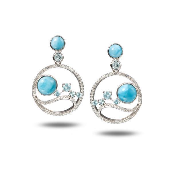 In this photo there is a pair of 925 sterling silver earrings with blue larimar, aquamarine, and topaz gemstones.