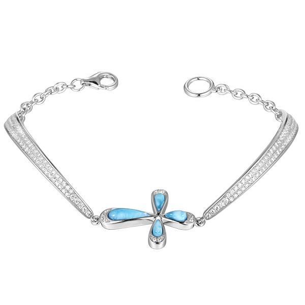The picture shows a 925 sterling silver larimar cross bracelet with topaz.