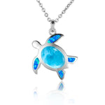 The picture shows a 925 sterling silver sea turtle pendant with one larimar gemstone and four opalite.