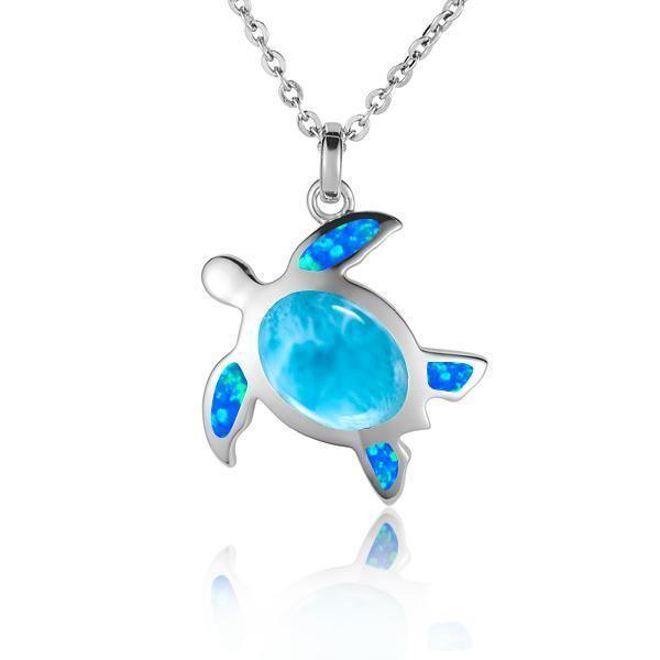 The picture shows a 925 sterling silver sea turtle pendant with one larimar gemstone and four opalite.