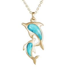 The picture shows a 14K yellow gold two dolphin pendant with larimar gemstones.