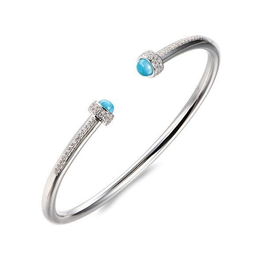 The picture shows a 925 sterling silver larimar bangle with topaz.