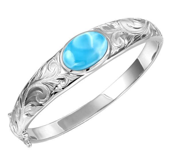 The picture shows a 925 sterling silver bangle with one oval larimar gemstone and engravings.