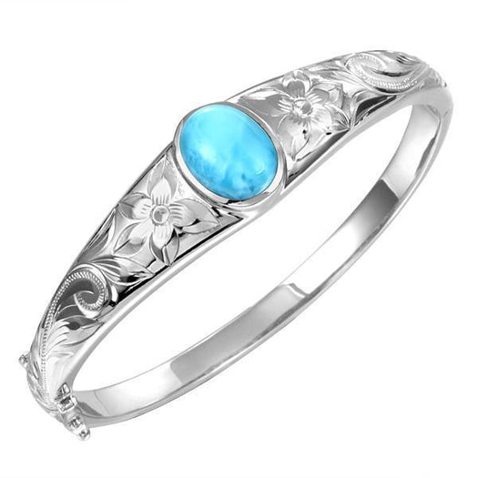 In this photo there is a 925 sterling silver bangle with one blue larimar gemstone and plumeria engravings.