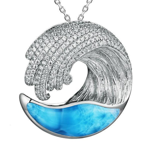 The picture shows a 925 sterling silver larimar ocean wave pendant with topaz.