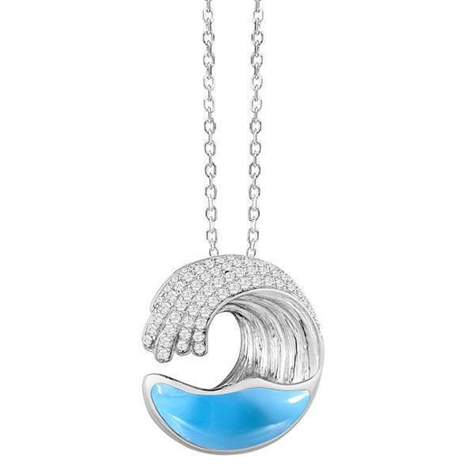 The picture shows a small 925 sterling silver larimar ocean wave pendant with topaz.
