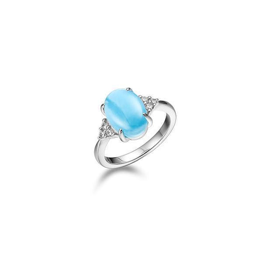 The picture shows a 925 sterling silver larimar oval ring with topaz.