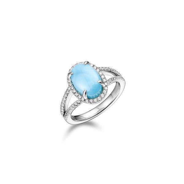 The picture shows a 925 sterling silver larimar oval split band ring with topaz.