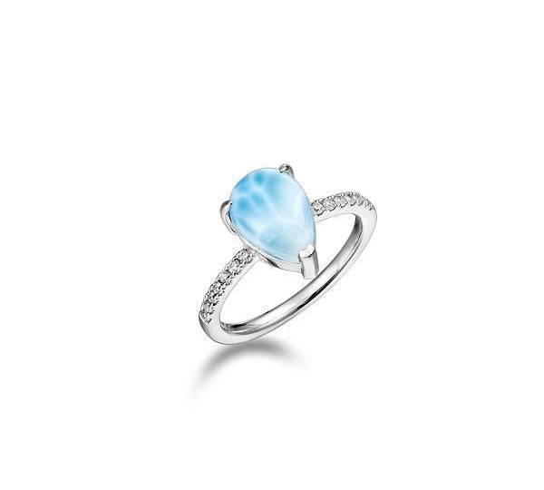 The picture shows a 925 sterling silver larimar petal ring with a topaz band.