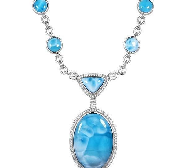 The picture shows a 925 sterling silver larimar necklace with circles, an oval, and a triangle, paired with cubic zirconia.