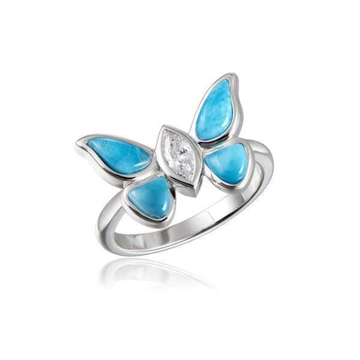 In this photo there is a 925 sterling silver butterfly ring with a blue larimar gemstone and aquamarine gemstones