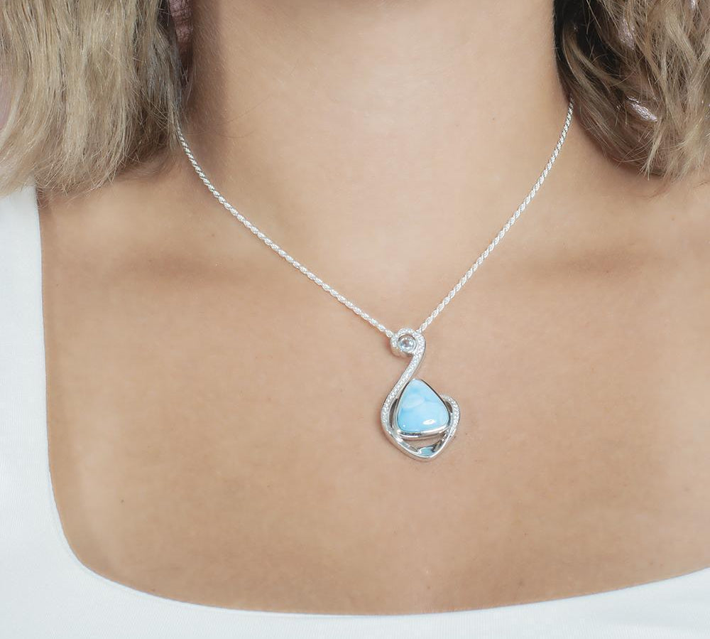 The picture shows a 925 sterling silver larimar reuleaux wave pendant.