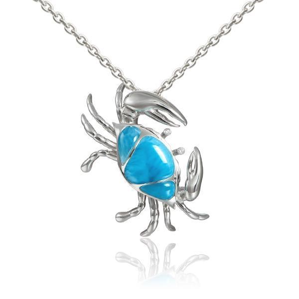 The picture shows a 925 sterling silver larimar sand dune blue crab pendant.