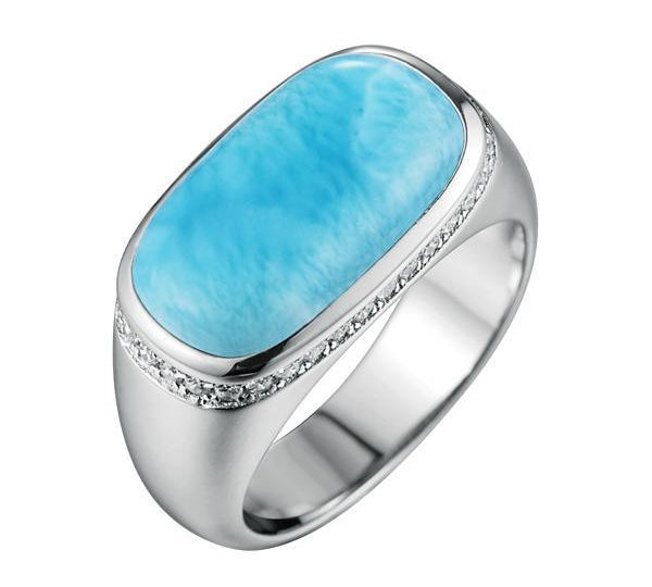 The picture shows a 925 sterling silver larimar oval ring with topaz.