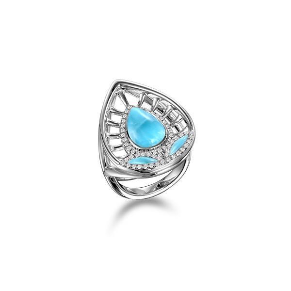 The picture shows a 925 sterling silver larimar shrine ring with topaz.