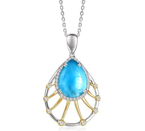 In this photo there is a sterling silver and gold plated tear drop pendant with topaz, aquamarine, and one blue larimar gemstone.