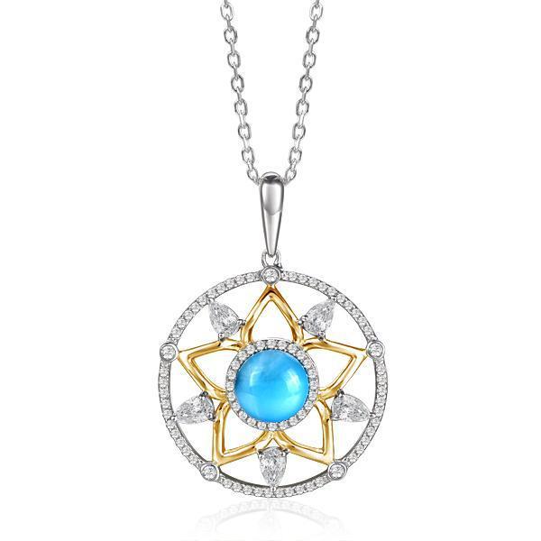 The picture shows a 925 sterling silver, yellow gold plated, larimar star lantern pendant with topaz.