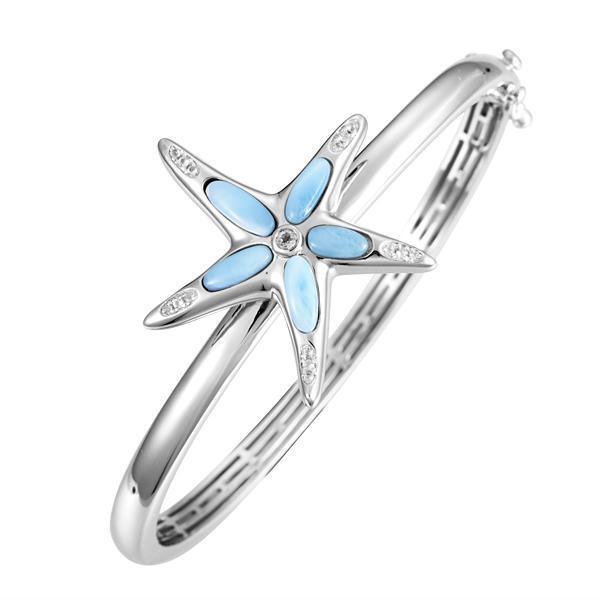 The picture shows a 925 sterling silver larimar sea star bangle with topaz.