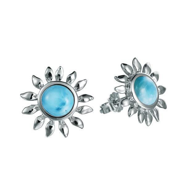 In this photo is a pair of 925 sterling silver sunflower stud earrings with blue larimar gemstones.