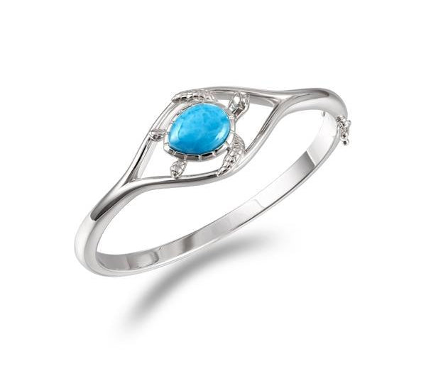 The picture shows a 925 sterling silver larimar swimming sea turtle bangle with topaz.
