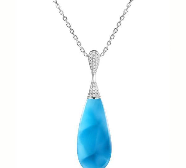 The picture shows a 925 sterling silver larimar teardrop pendant with topaz.