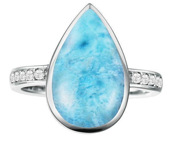 The picture shows a 14K white gold larimar teardrop ring with a diamond band.