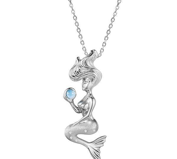 The picture shows a large 925 sterling silver larimar wishing mermaid pendant.