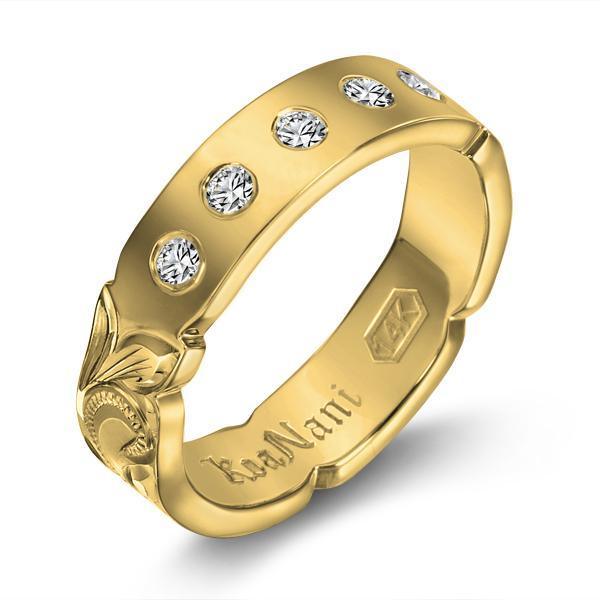 The picture shows a 14K yellow gold 4mm ring with hand engravings and diamonds.