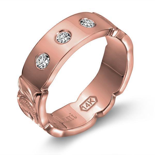 The picture shows a 14K rose gold 6mm ring with hand engravings and diamonds.