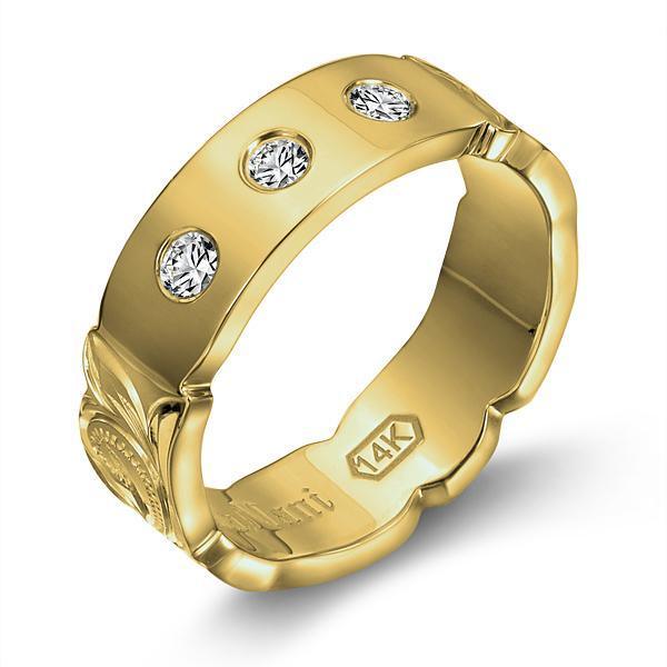 The picture shows a 14K yellow gold 6mm ring with hand engravings and diamonds.